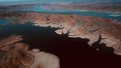 outdoors high-angle photography of river during daytime land