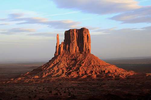 desert landscape photo of monolith outdoors