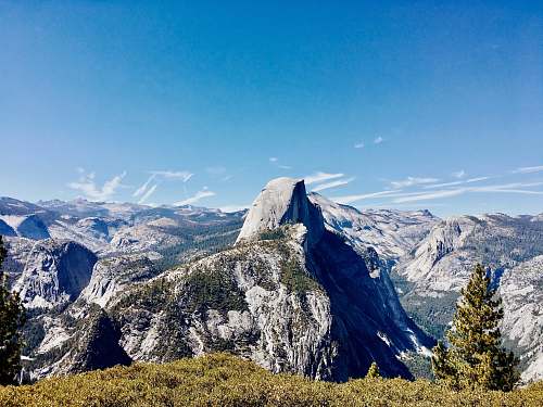 outdoors mountain range under clear blue sky mountain