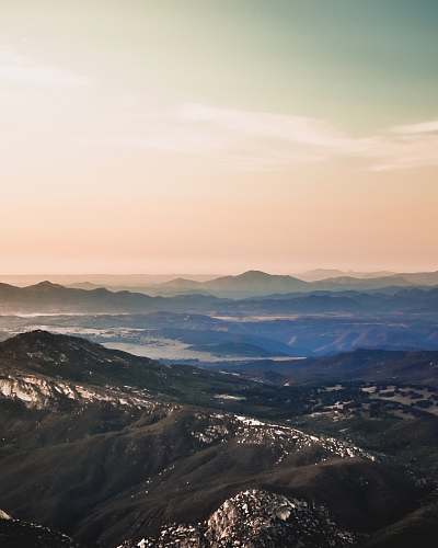 outdoors mountain range under clear sky during daytime sky
