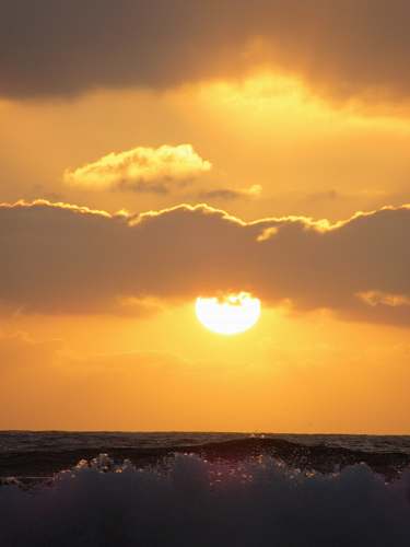 dawn wavy ocean during sunset dusk