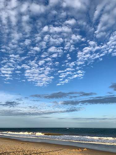 outdoors white clouds and seashore ocean