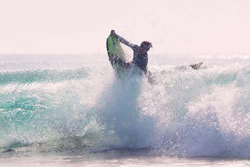 water man riding bodyboard sports