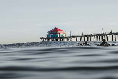 pier red and blue house near dock dock