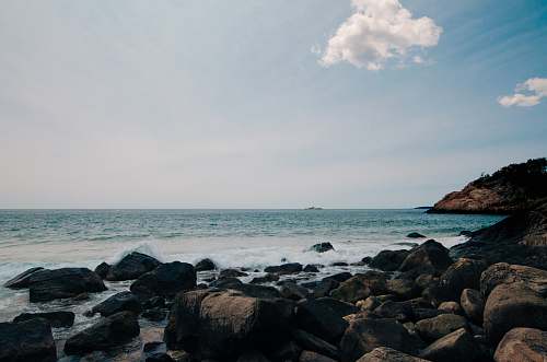 water rocks on shore nature