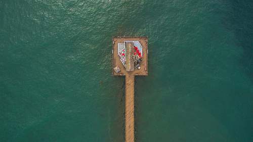 california aerial shot photo of brown dock surrounded with body of water united states