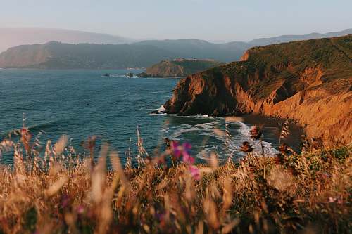 nature cliff during daytime promontory