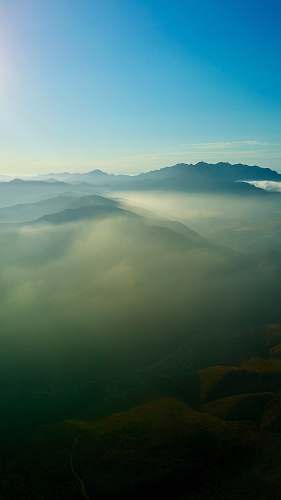 nature mountain covered i fog fog