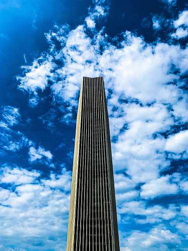 nature white high-rise building under white and blue cloudy skies azure sky