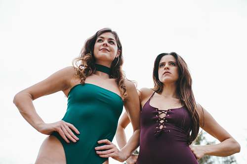 human low-angle photography of two women wearing swimsuits person