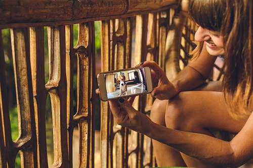 human woman using smartphone person