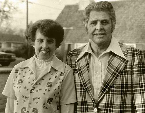 human grayscale photography of smiling man and woman people