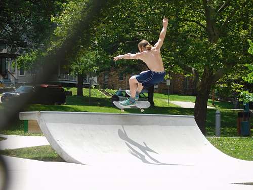 human topless man skateboarding machine