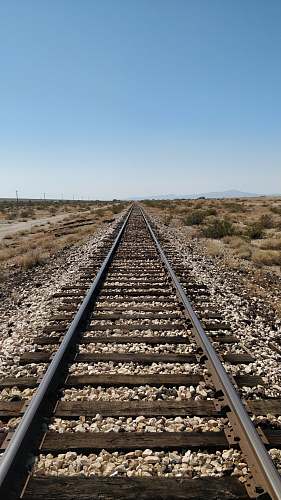 railway train track under blue sky train track