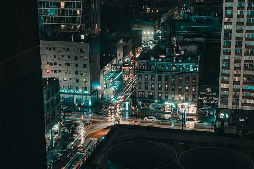 city aerial photography of lights in city buildings during nighttime intersection