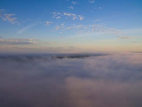 dawn aerial view photography of cloudy sky dusk