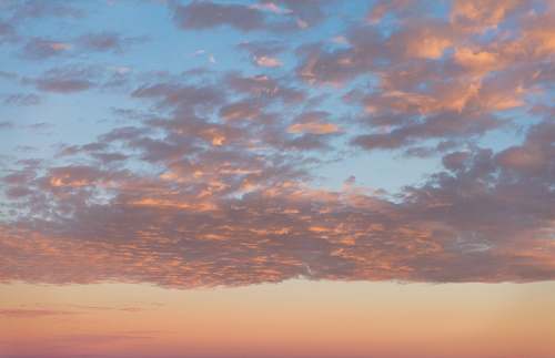 sunset cloudy sky during golden hour sunrise