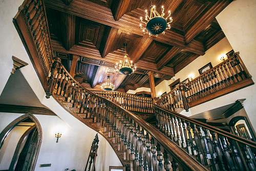 banister white and brown wooden house with stairs handrail