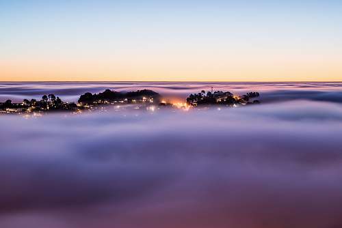 sunset The foggy sunrise over Twin Peaks in San Francisco lagoon