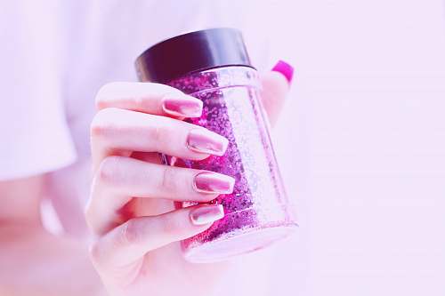 nail person holding pink container ogden