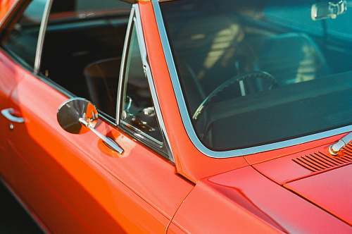 car orange coupe vehicle