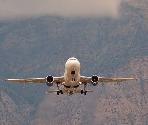 vehicle white airliner on flight during daytime aircraft