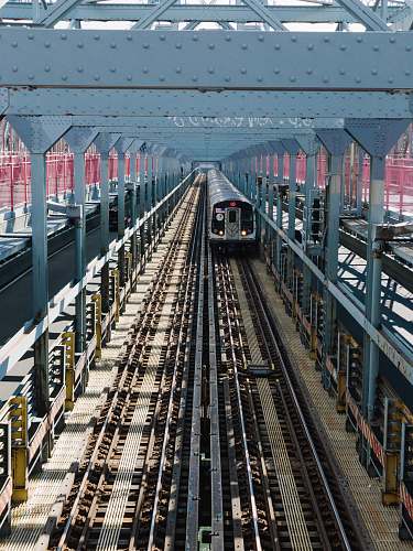transportation gray train during daytime train