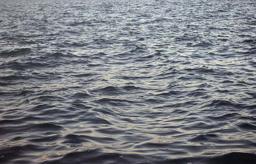 grey body of water ripple