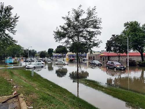 flooding cars on flooded street flood