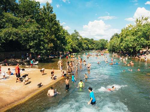 outdoors group of people in body of water during daytime austin