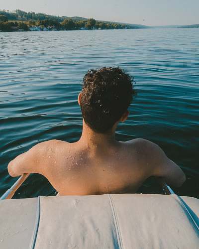 pool man half bath in body of water swimming