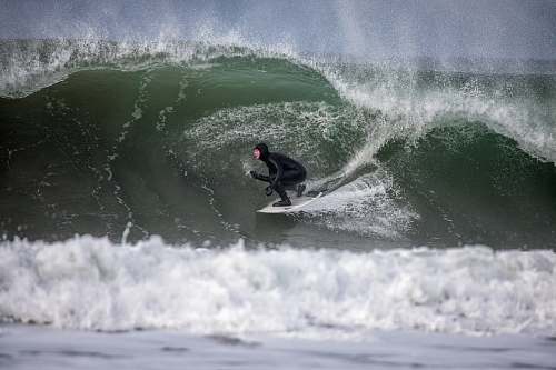 ocean person surfing using white surfboard sea