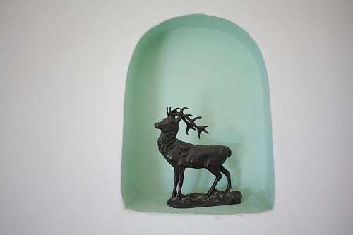 mammal black deer figurine antelope
