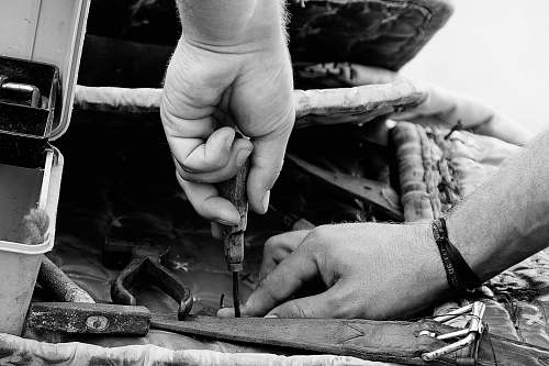 person person holding a hand tool human
