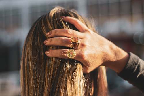 person brunette woman holding her hair human