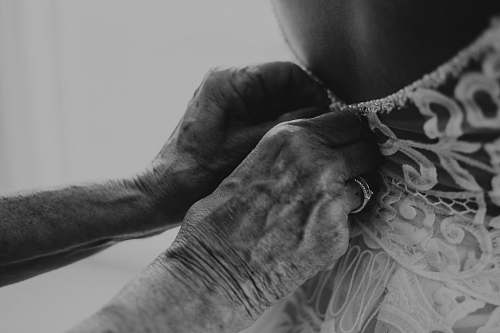 hand person holding dress black-and-white