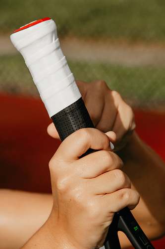 clothing person holding tennis racket apparel