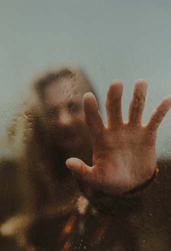 hand person touching glass brown