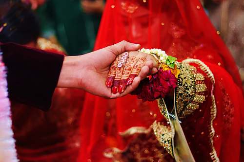 lahore woman in red and gray wedding sari dress pakistan