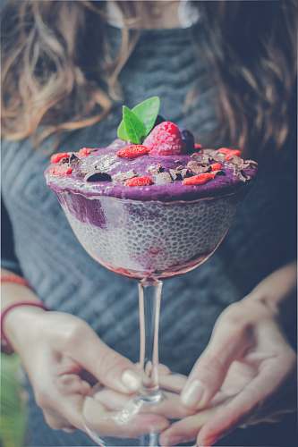 food shaved ice with strawberry and blueberry toppings dessert