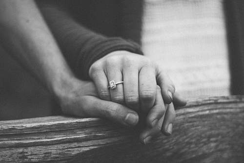 black-and-white grayscale photography of couple holding hands love