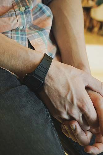 person black digital watch with black straps human