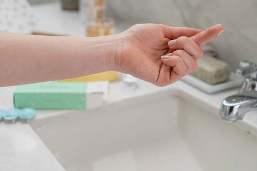 person eye contact lens on a person's finger human