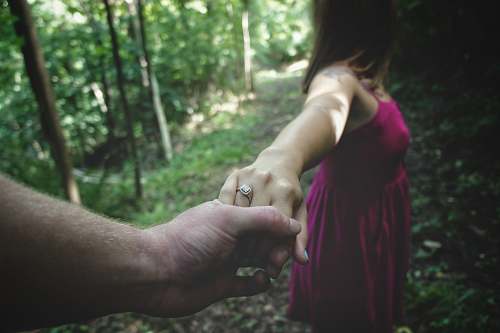 person gold-colored ring human