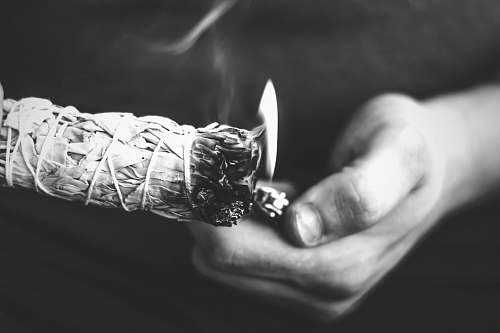 black-and-white grayscale photo of lighted paper jewelry