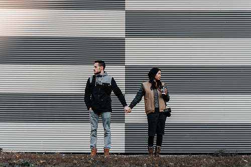 human man and woman holding each other's hands person