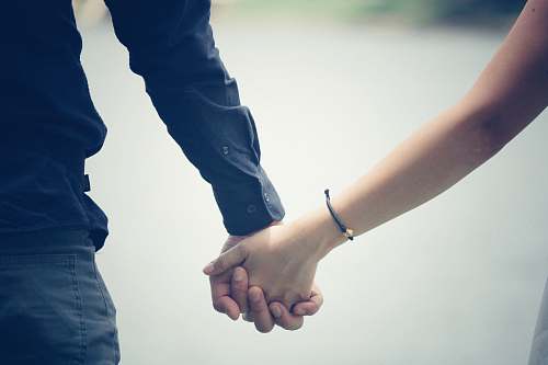 person man and woman holding hands human