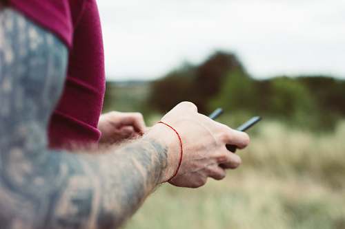 arm man holding drone remote skin