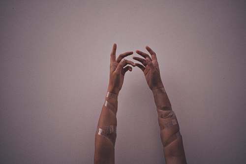 human person hands with gray wraps person