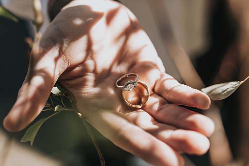 ring person holding bridal ring set jewelry